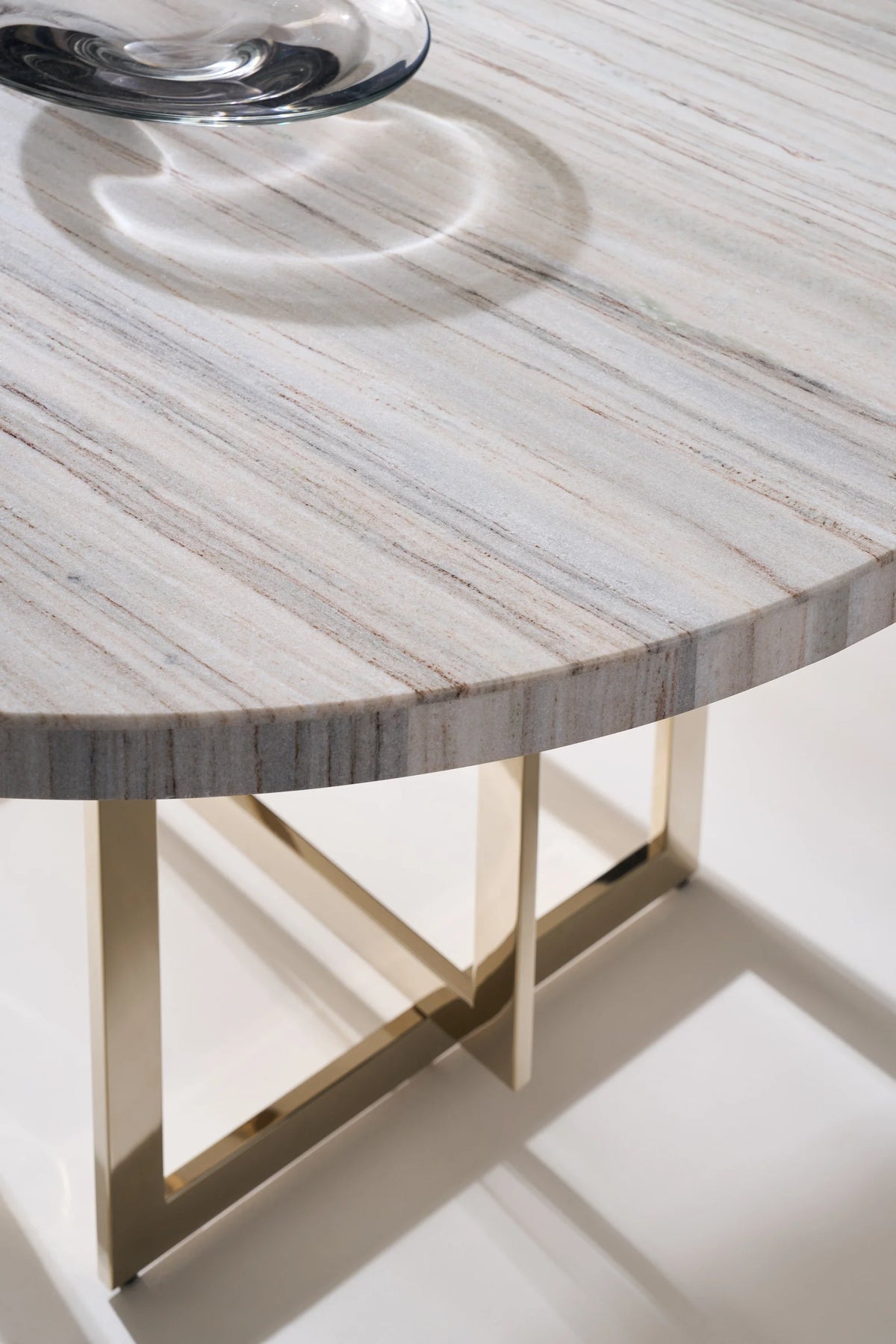 Caracole Wish You Were Here Round Dining Table – side view – Lusso Furniture Miami