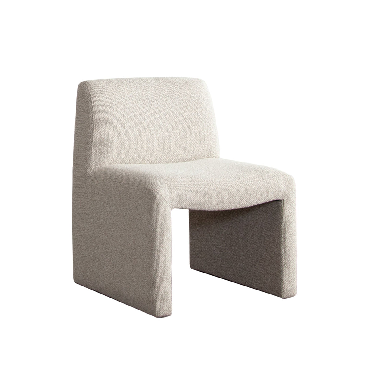 Coral Armless Upholstered Dining Chair – angle view – Lusso Furniture Miami