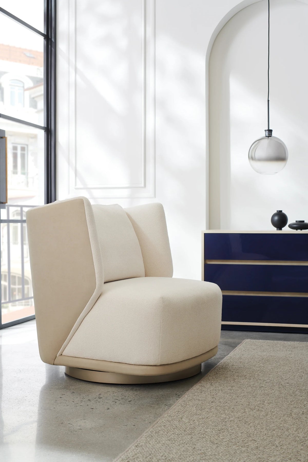 Caracole Seville Swivel Chair – angle view – Lusso Furniture Miami